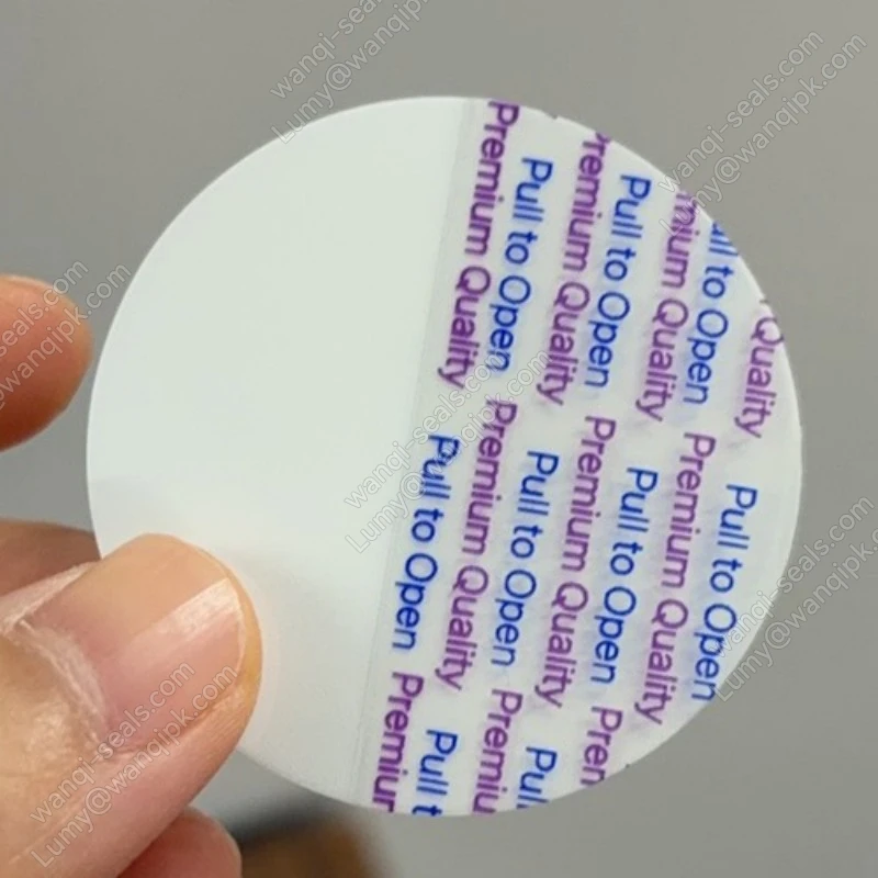 بطانة الختم التعريفي Lift N Peel لزجاجات PET &ndash; TBE-1520TY | سهل الفتح، لا يترك بقايا